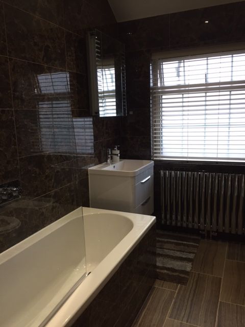 Bathroom fitting and finishing work by A&B London Construction